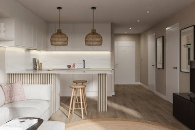 View from living room of handleless Wabi sabi inspired Integra Brunswick Limestone kitchen combined with living area, wood barstools for breakfast bar, natural materials, Euros oak flooring.