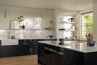 Traditional Shaker-style tactile woodgrain Ludlow Sumi Black kitchen with  kitchen island, light and airy with brass accessories, marbled white and grey worktop, Amtico oak stripwood vinyl flooring.