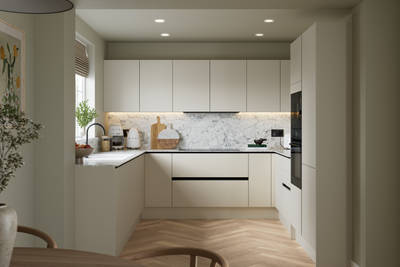 Open plan light neutral shade fluted kitchen with integrated appliances, white and grey marble worktop and upstand. Herringbone wood flooring.