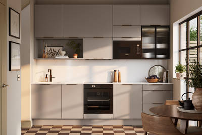 Modern slab front Soho Cornish Clay kitchen from Magnet in Pantone’s colour of the year ‘Mocha Mousse’ with bronze trim handles, handles, silestone quartz worktop and matching backsplash, checkered flooring.