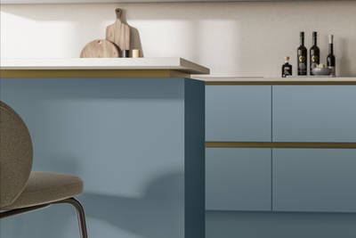 Frameless slab door Integra Soho Portland Blue from Magnet with integrated handles in a smooth paint finish, perfect for a modern, minimalist kitchen with linear, clean lines.