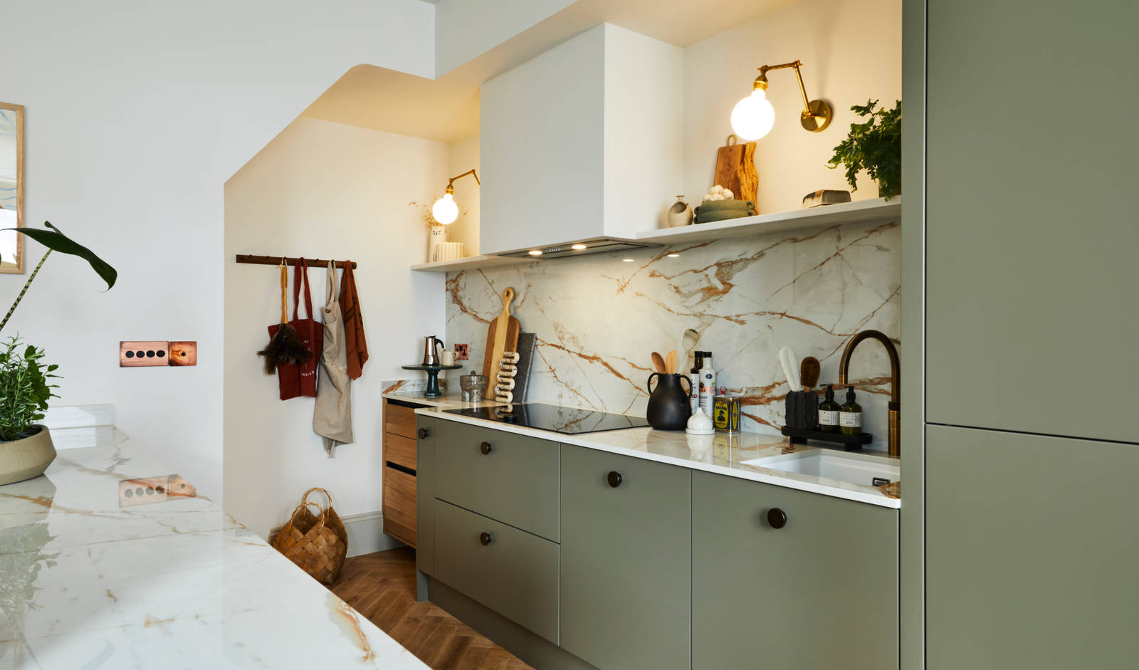 Modern slab Soho cabinets in the Balmoral colour, a soft beige green tone