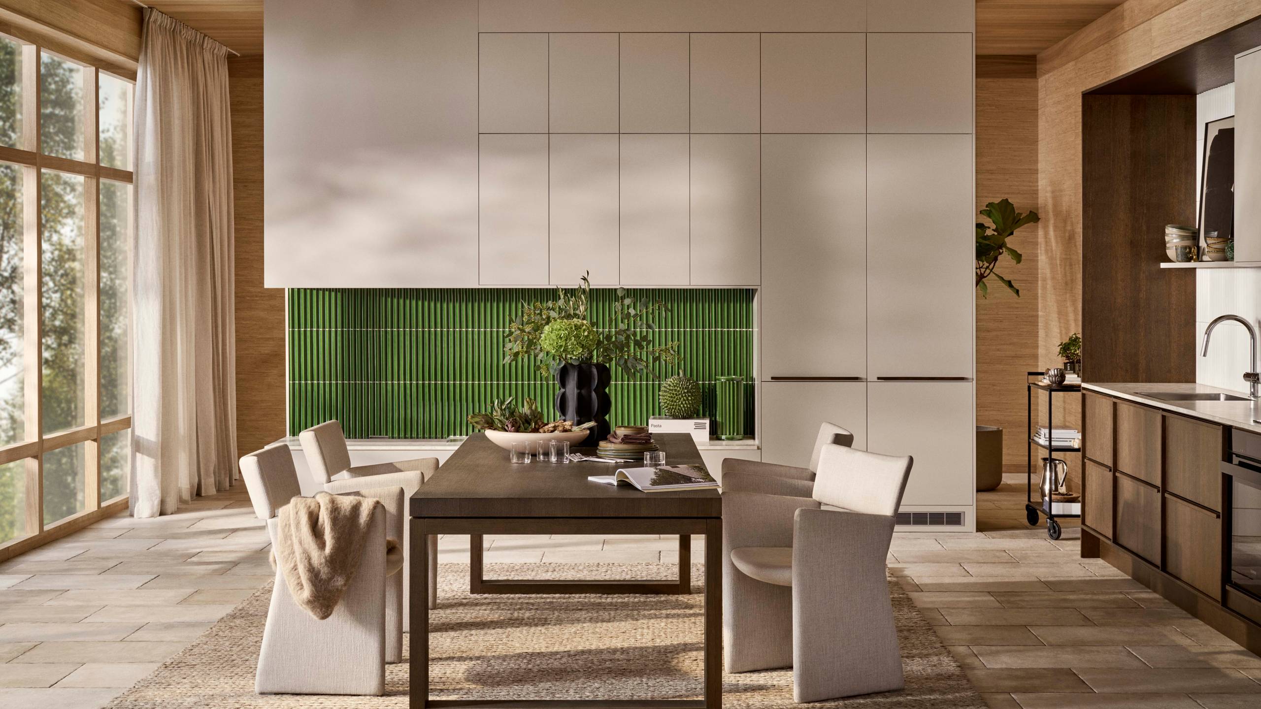 Ved å kombinere kjøkkenmodellen Line i fargen Korn og Signatur Nøtt har vi fått frem et lekent og inspirerende kjøkken med rom for ro og sosiale samvær.