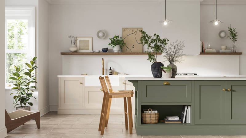 Traditional Shaker-style kitchen range in light shade Pebble path with a green Misty Moors kitchen island.