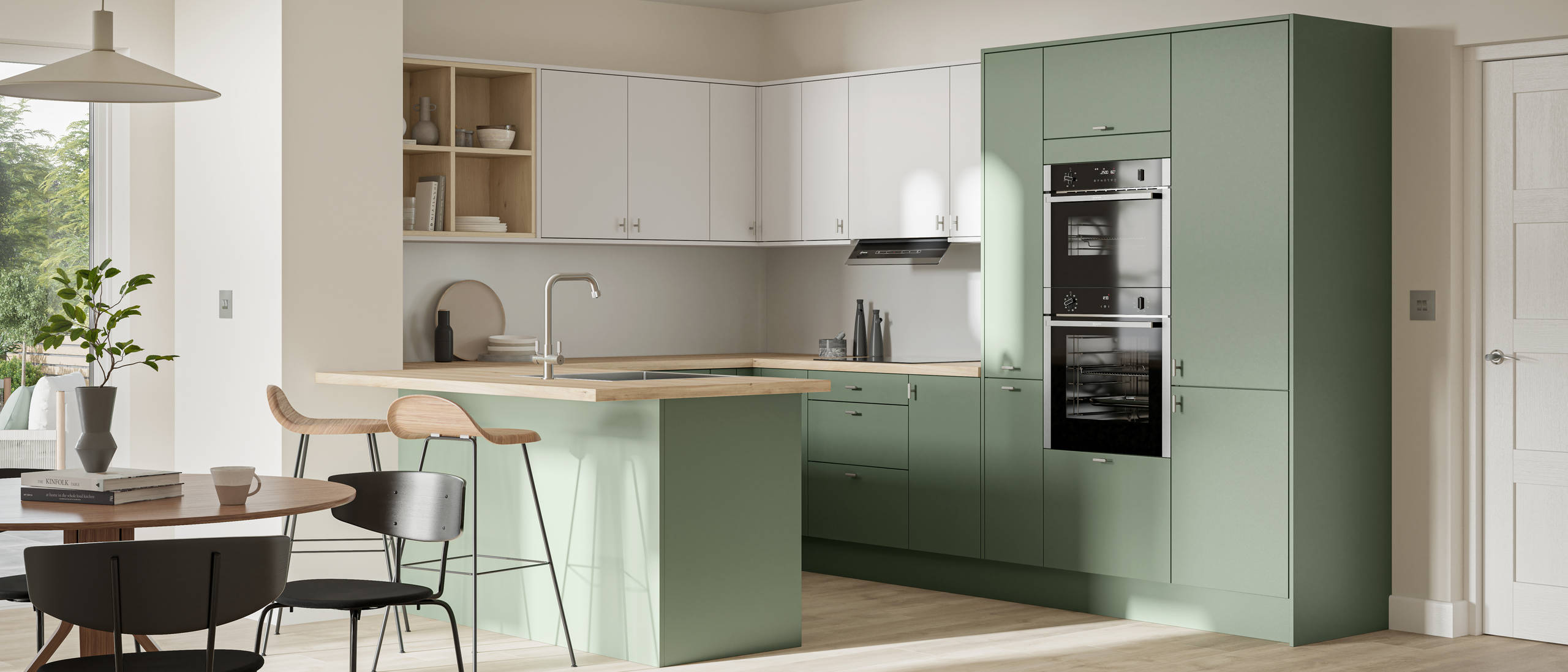 Contemporary scandinavian influenced Ascoli kitchen in fresh shade green Woodland and light grey, wall cabinets with timber accents like open shelves and oak laminate worktop, matched with oak laminate flooring and wood barstools at breakfast bar.