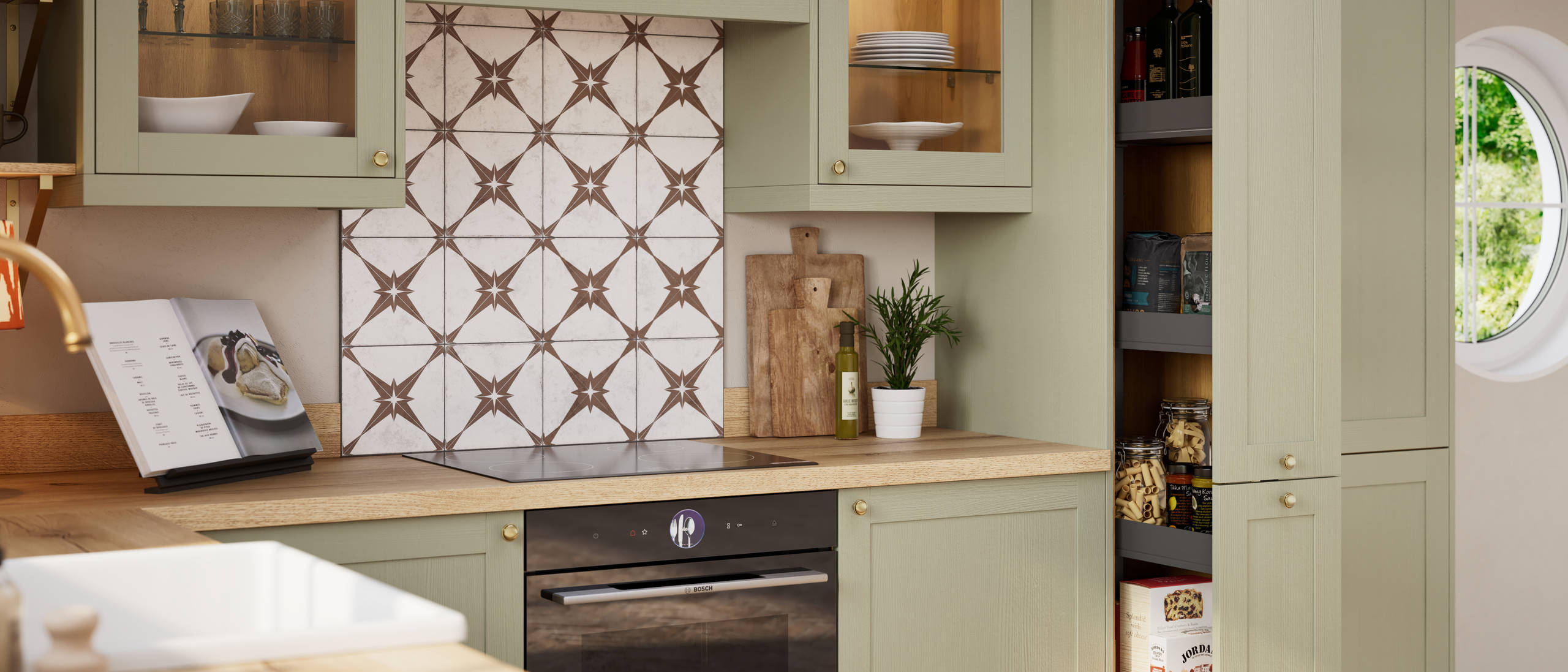 Opened pull-out larder in contemporary Shaker kitchen Ambleside from Magnet in sage green shade Meadow with belfast sink, aged taps and wooden effect worktop.
