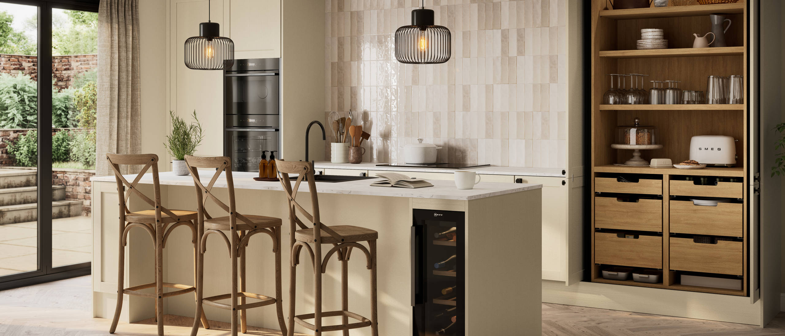 Contemporary Shaker kitchen Ambleside from Magnet in neutral shade Sand with black sink and tap in kitchen island, induction hob with extractor and tall cabinet pocket door larder, wine cooler in kitchen island.