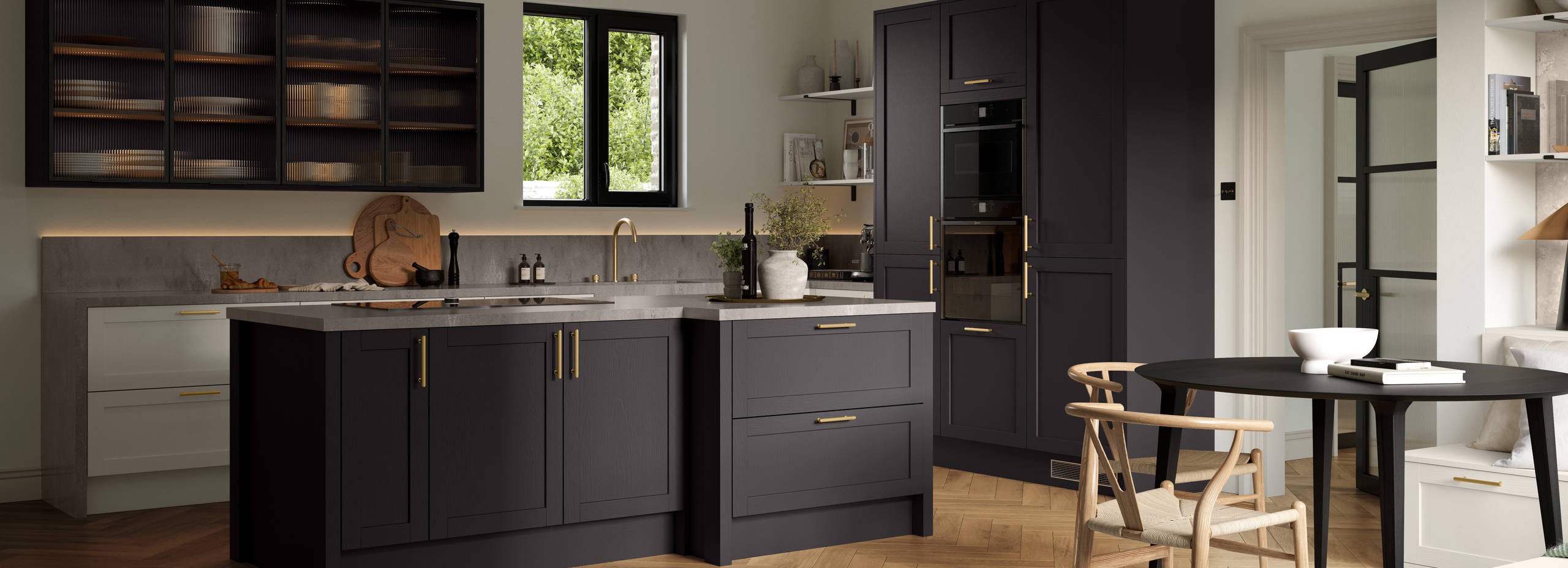 A contemporary Shaker kitchen with black cabinets and hardwood floors, paired with fluted glass cabinets.