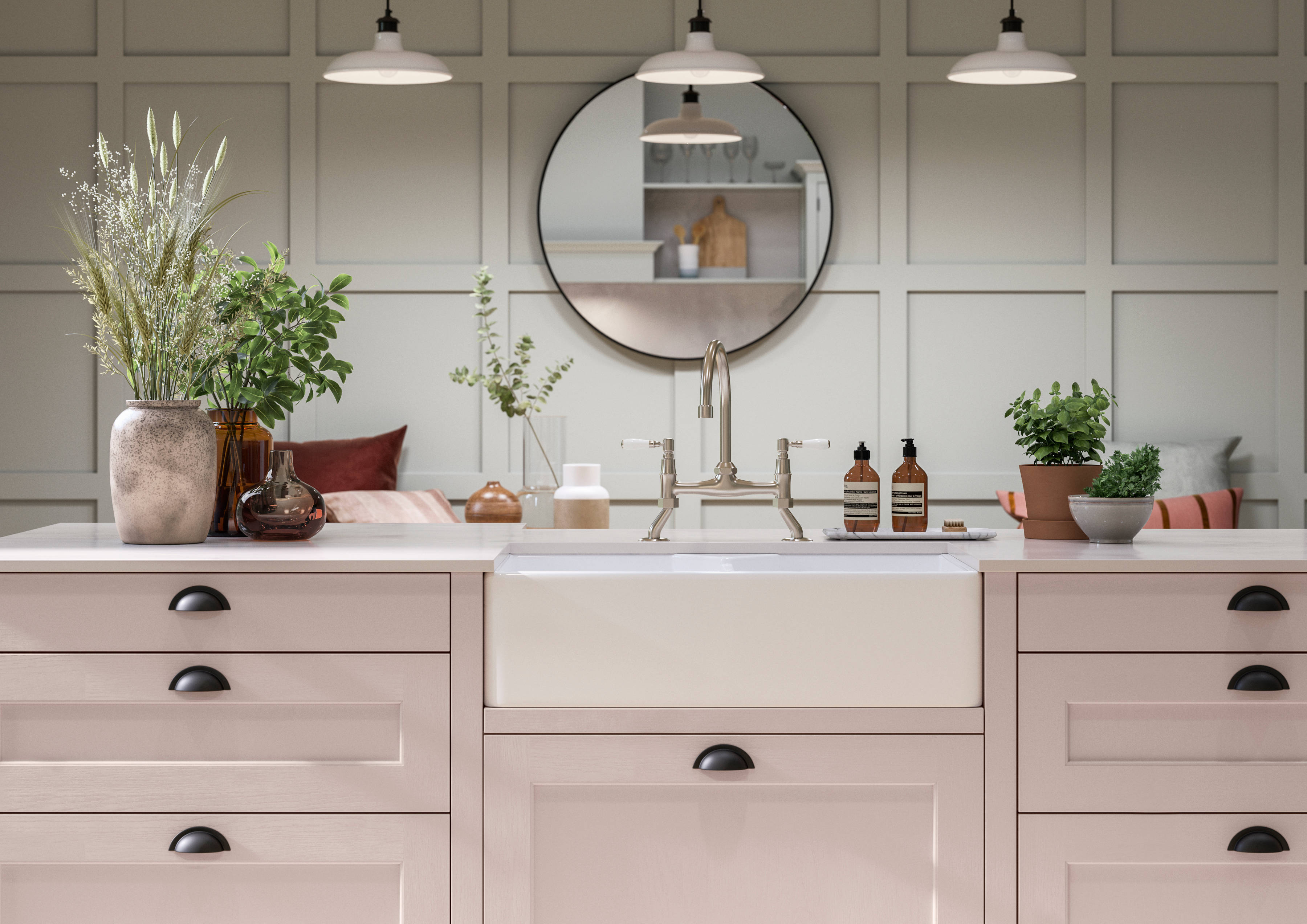 Ludlow kitchen. Our latest Shaker door, with a modern country-style. Here in the light pink shade Rose bowl, paired with plants in earth tone planters.