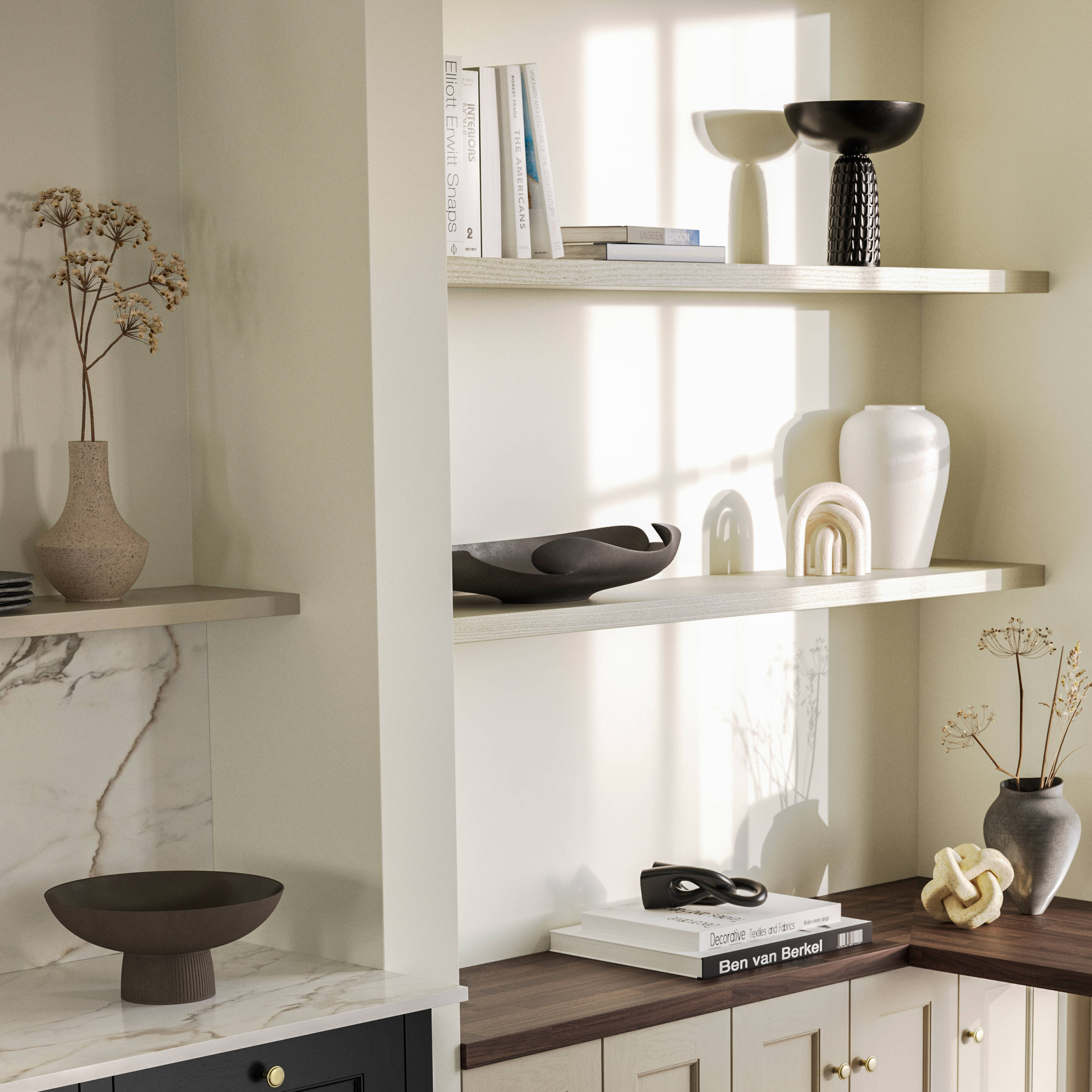 View over kitchen island in Traditional Shaker-style tactile woodgrain Ludlow Sumi Black kitchen, brass details, and dark wood worktop in home office with Ludlow French clay seating area by black metal frame full height window.