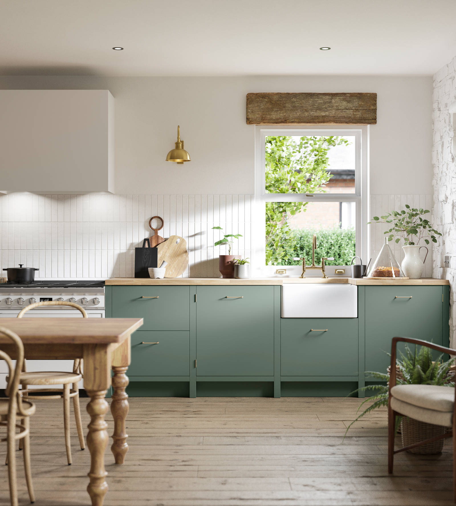 Soho Eucalyptus green open plan kitchen in contemporary cottage with a light wood dining table.