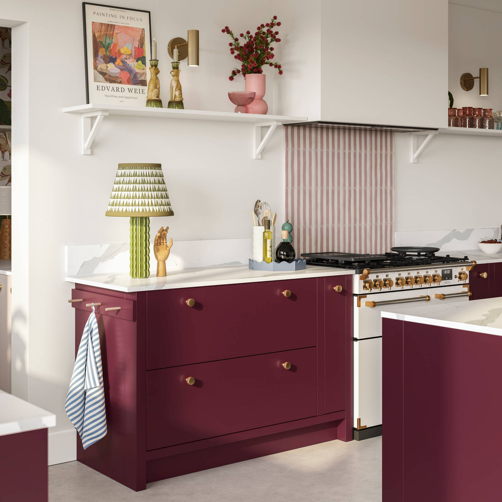 Modern slab front Soho Morello and Shell kitchen with kitchen island, Bianco calacatta worktop and upstand, brass knobs and open wall shelves holding eclectic decorations and glasses.