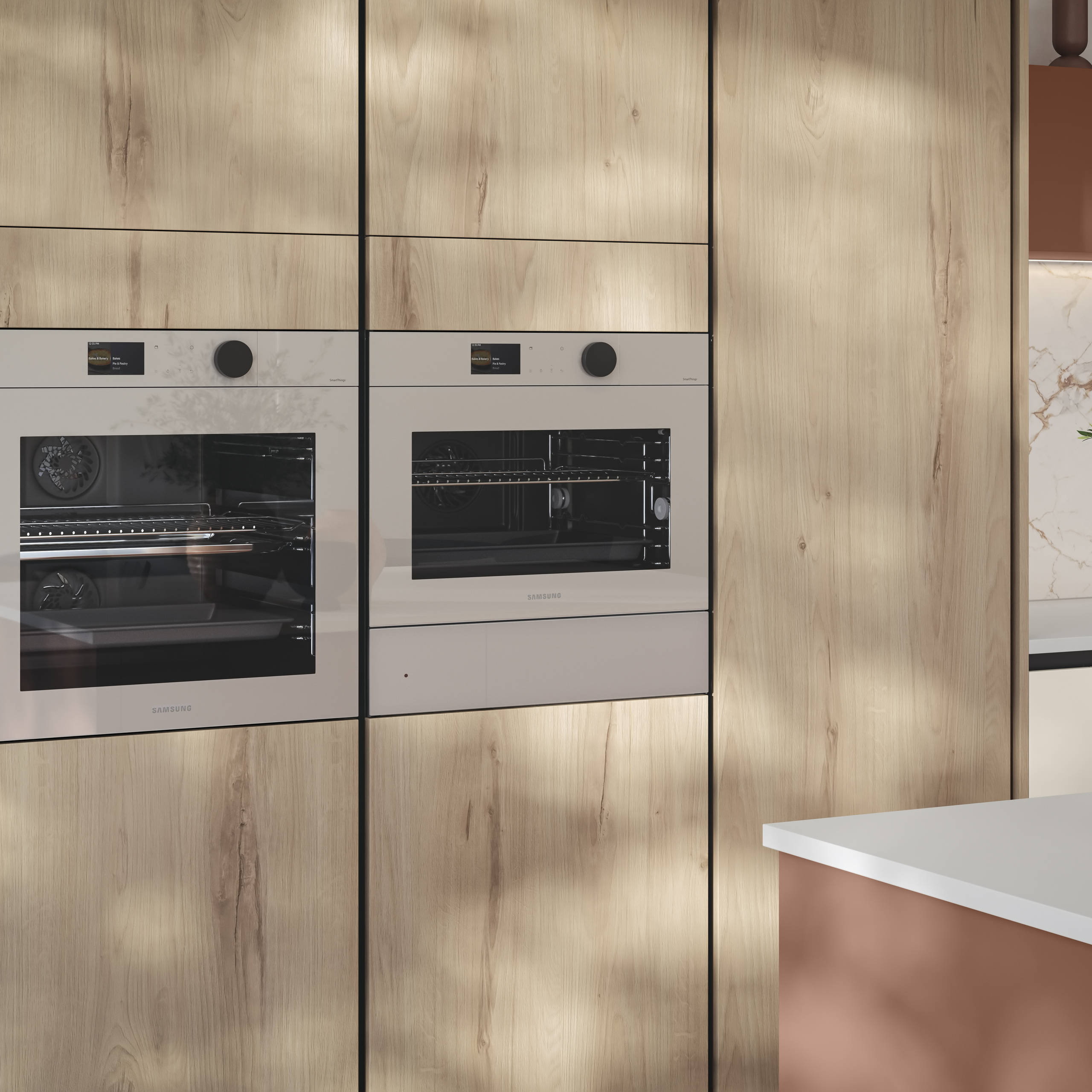 Tall Integra Portobello Bosco cabinetry, a contemporary handleless slab with with organic woodgrain texture, and integrated Samsung ovens.