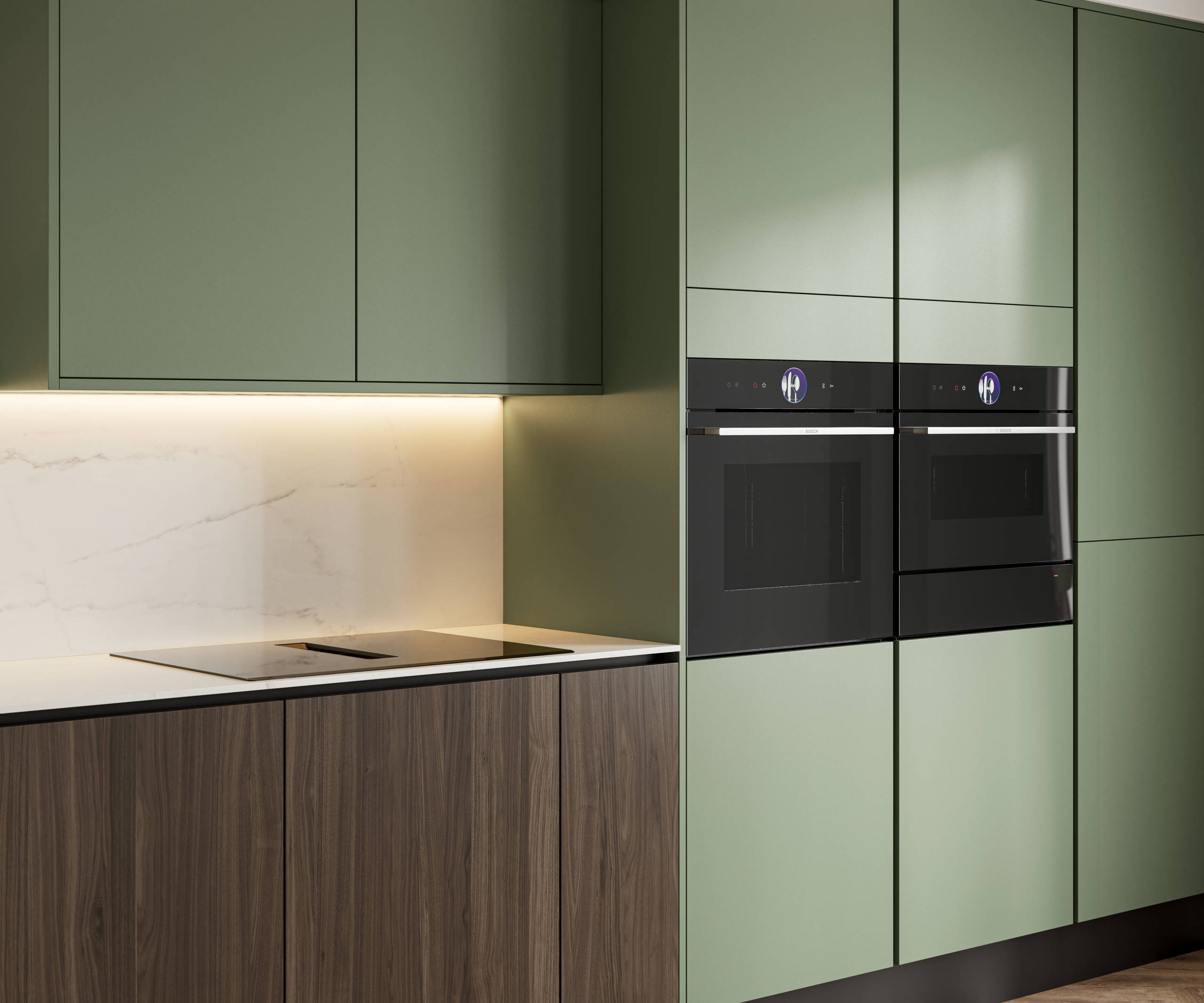 Integra Ascoli Woodland green, matt green slab fronts on handleless cabinets with white and grey marble worktop, matching upstand