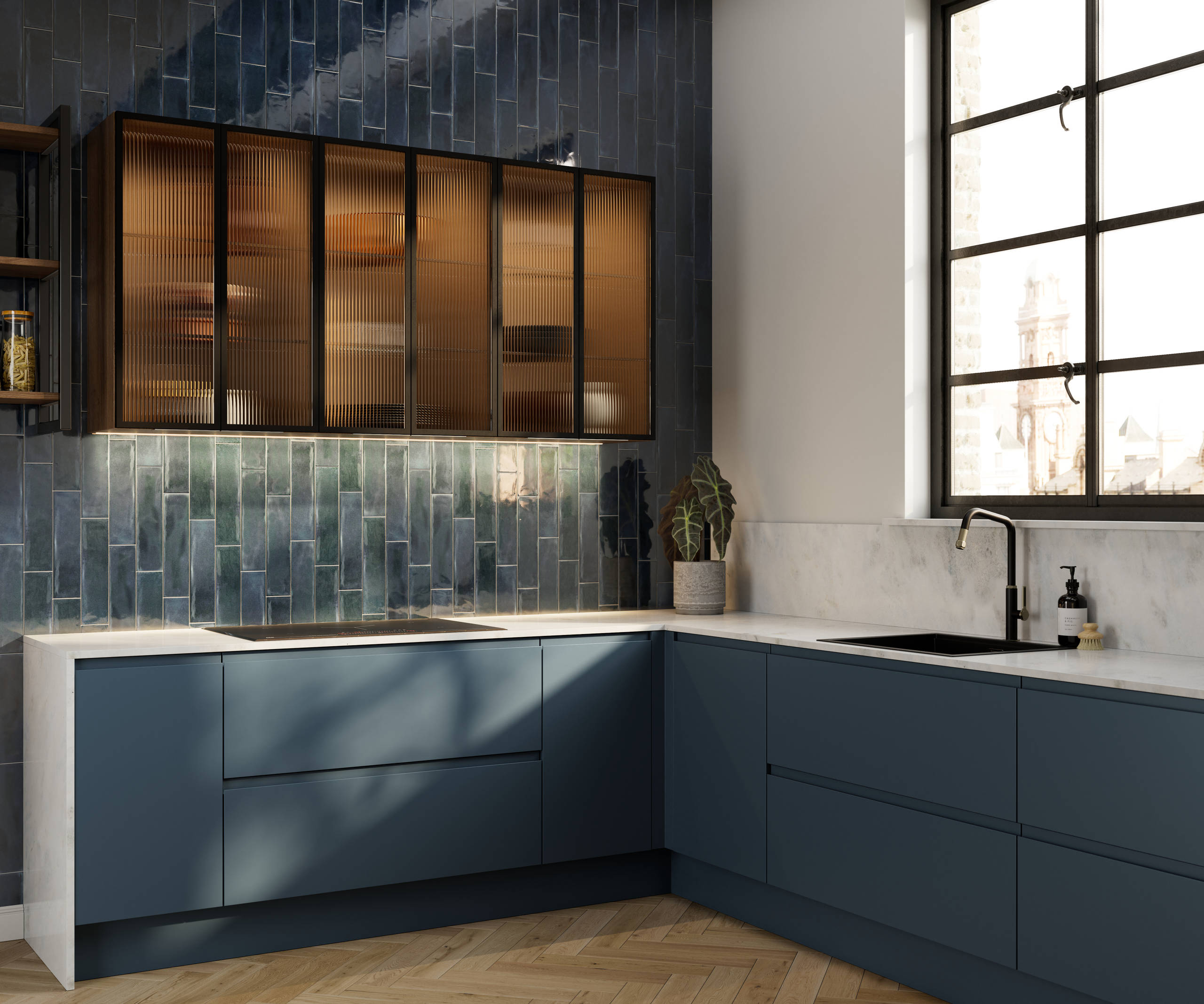 Contemporary and minimalist handleless kitchen with J-Pull door in dark blue shade Mineral Blue, with fluted glass vitrine wall cabinets and tiled wall.