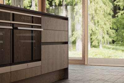 Integra Nordic Nature. Modern kitchen concept with a sleek handless design and fluted oak effect wood doors
