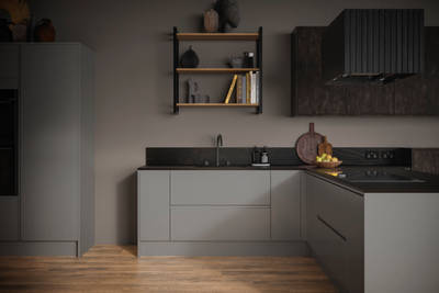 Modern Duxbury kitchen cabinets in Fawn, with seamless J-pull handles that give a sleek uniform look.