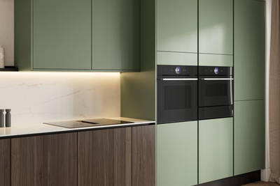 Integra Ascoli Woodland green, matt green slab fronts on handleless cabinets with white and grey marble worktop, matching upstand