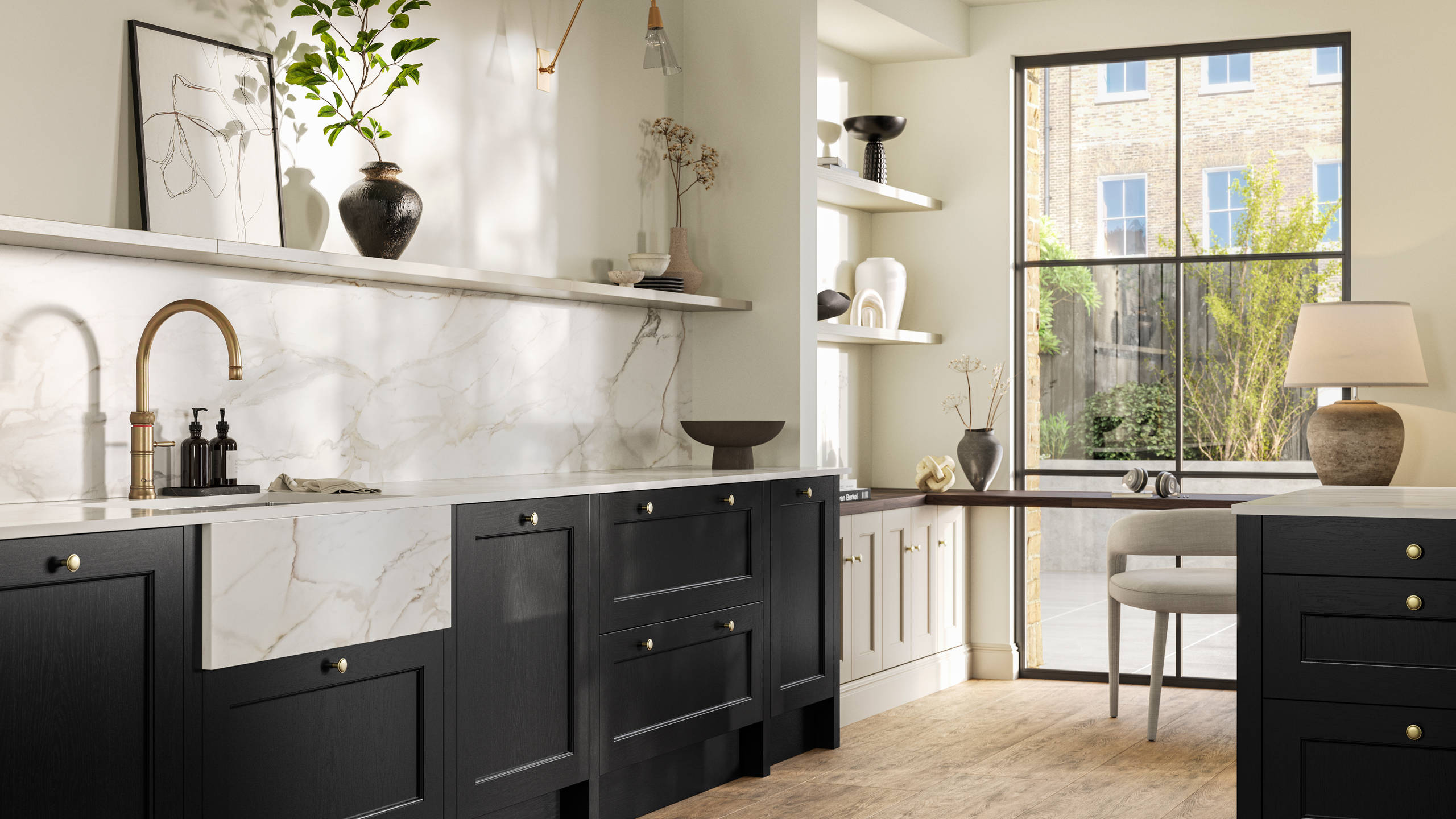 Traditional Shaker-style tactile woodgrain Ludlow Sumi Black kitchen with kitchen island, light and airy with brass accessories, marbled white and grey worktop, home office area by full height windows and Amtico oak stripwood vinyl flooring.