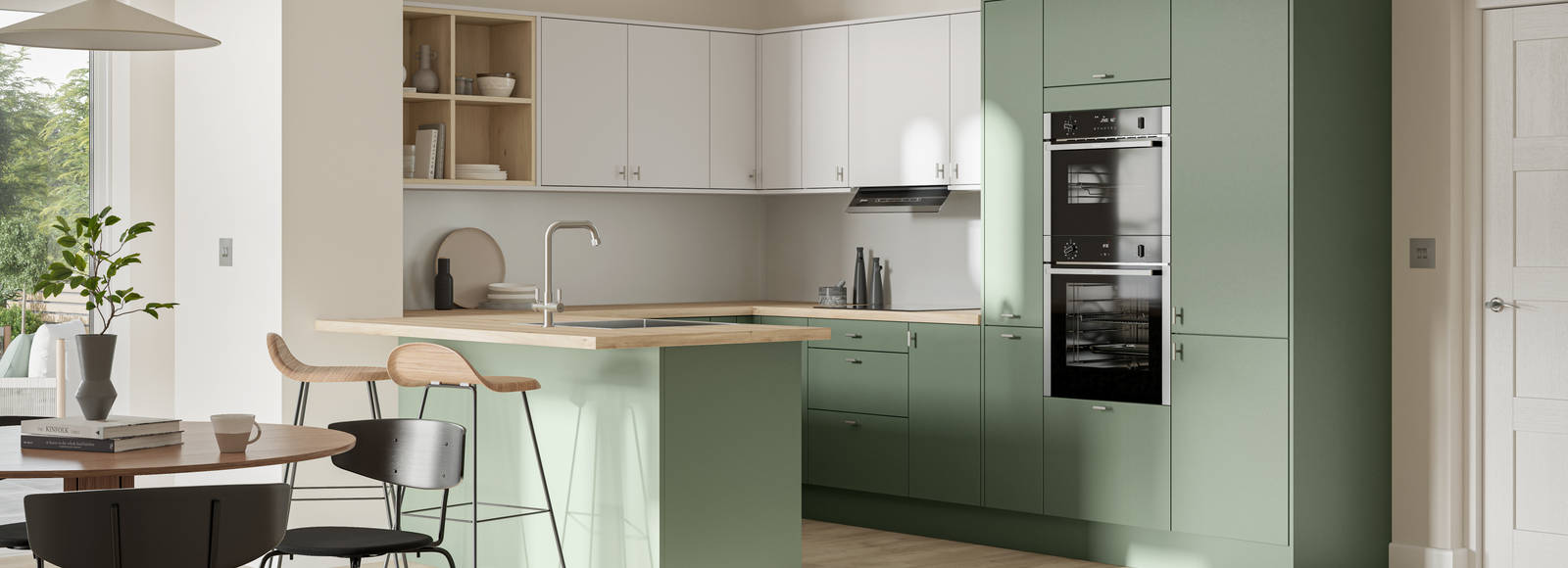 Contemporary scandinavian influenced Ascoli kitchen in fresh shade green Woodland and light grey, wall cabinets with timber accents like open shelves and oak laminate worktop, matched with oak laminate flooring and wood barstools at breakfast bar.